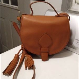 Isabella Fiore leather saddle crossbody bag.